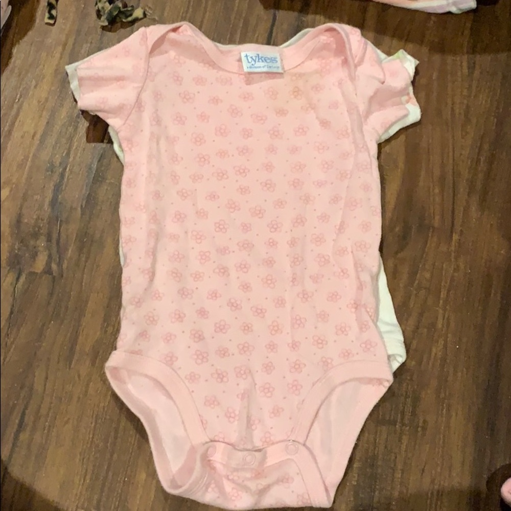 Pink onesie with flowers